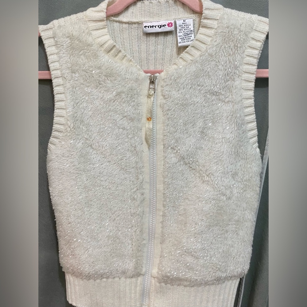 Energie Faux fur full zip Women's vest. Faux fur with knit trim and back.
